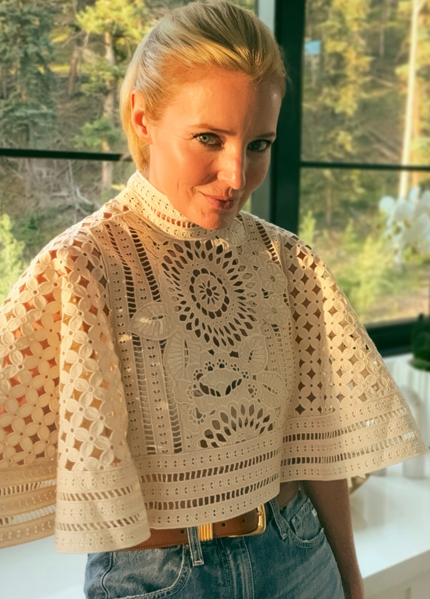 Zimmermann broderie anglaise is in a category of its own!

This cream cape with its intricate cutwork floral embroidery, mock neck, and dramatic wide sleeves is a statement piece that somehow still feels wearable; styled here over straight leg jeans with a tan leather belt to ground it. The craftsmanship up close is genuinely breathtaking. 

 #LTKdayinmylife #LTKgrwm #LTKOver40