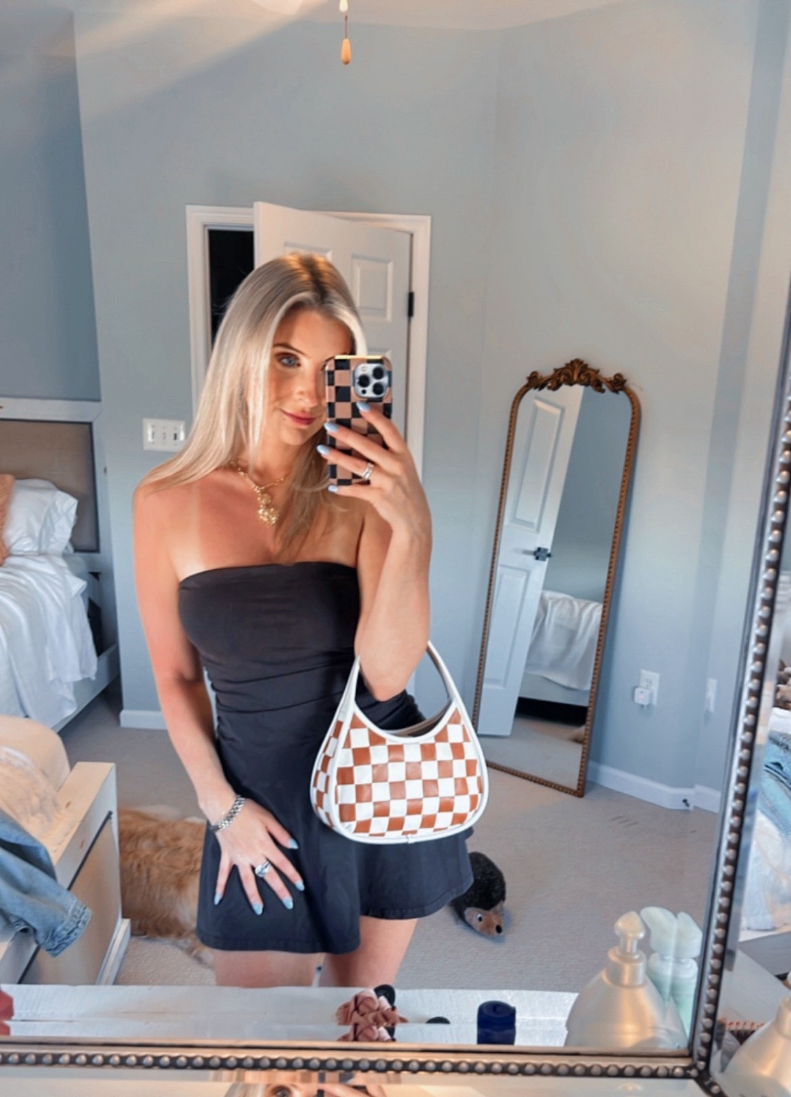 Wearing size small 🤎 tts

*Dress is 50% off and still available in some sizes in other colors. 

Linked the black version of the dress and purse 🖤