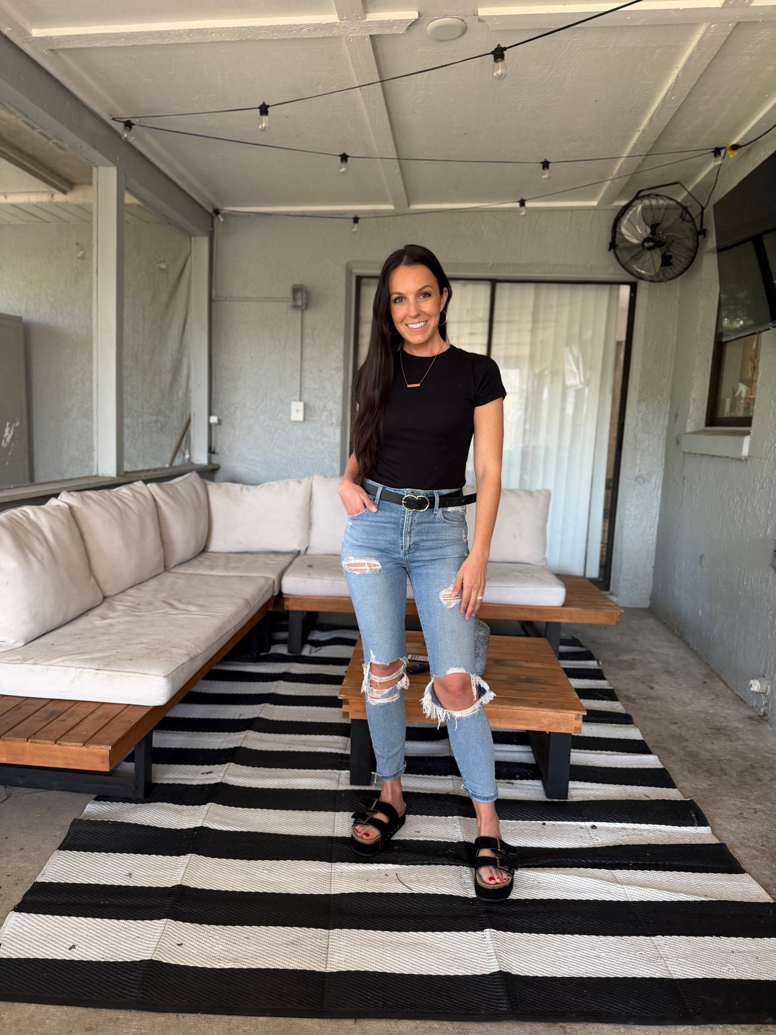 Black ribbed fitted. T-shirt
High waisted ripped jeans 
Black and gold belt
Black sandals
Gold bar necklace 
Laid back style 
Casual outfit 

#LTKFindsUnder100 #LTKPetite #LTKmomlife
