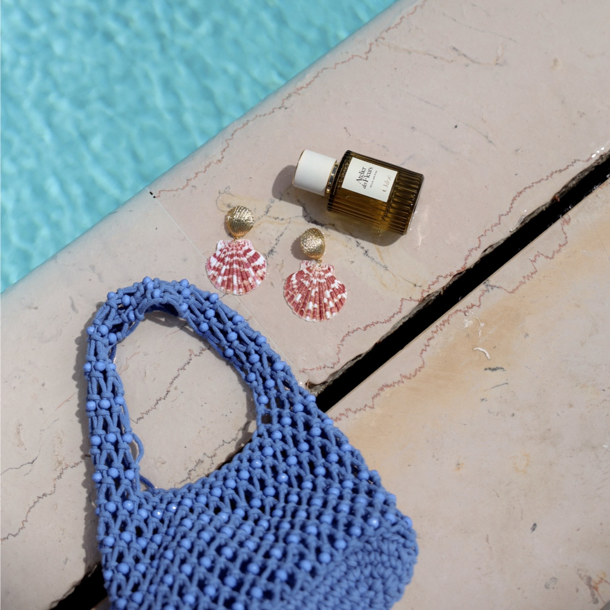 Blue beaded bag, summer fragrance, shell earrings, summer jewellery, holiday outfit

#LTKuk #LTKsummer #LTKeurope
