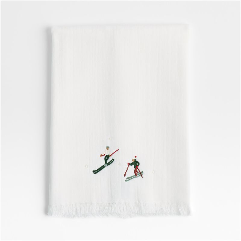 Holiday Snow Fun Sled and Snowball Guest Towel | Crate & Barrel | Crate & Barrel