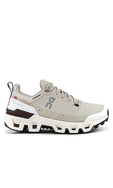 On Cloudwander Waterproof Sneaker in Sand & Ivory from Revolve.com | Revolve Clothing (Global)