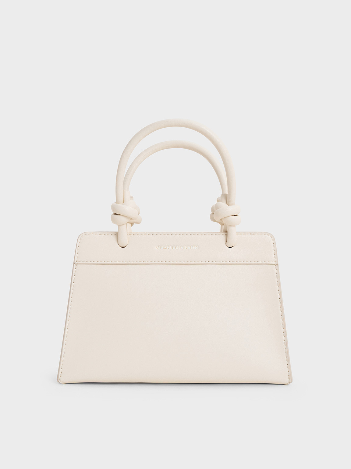 Cream Sabine Knotted-Handle Trapeze Tote Bag | CHARLES & KEITH | Charles & Keith AU