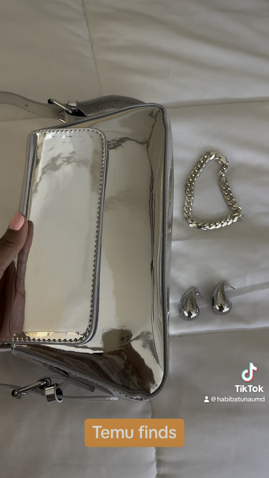 Temu finds from the “Pink Hot Mess” clothing, bags, wig’s & accessories haul 🤣 Seriously the Metallic bag and black & white skirt is a steal! 💕 
As you may already know the prices may vary at different times and with different vendors. 
Some things like the tiny Birkin bag seen in the video is discontinued at this time but may come back in stock later. I have linked as many of the items I could find again 😅 

#LTKFind #LTKSale #LTKstyletip