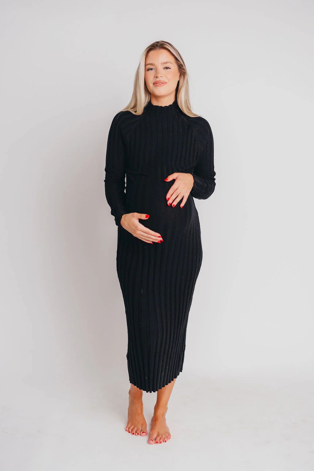 Ribbed Knitted Turtle Neck Midi Sweater Dress in Black | Worth Collective