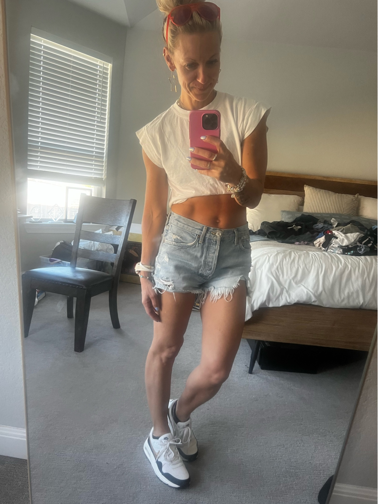 It’s still 100 in Texas in Fall so keeping it cooler with some a target tee, Jean shorts and these black and gold Nikes