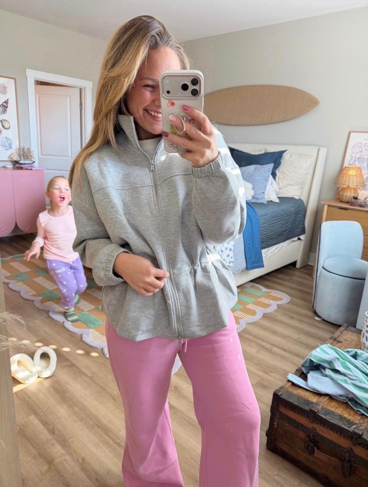 Real life mom uniform but make it cute 💗

This zip-up is that perfect throw-on layer — soft, lightweight, and actually flattering with the slight cinch at the waist. It gives “I tried” without actually trying. Paired it with these pink wide-leg lounge pants for the coziest, most wearable combo.

School drop-off, errands, working from home, chasing toddlers… she does it all.

Fit notes:
• Jacket runs true to size with a relaxed fit
• Lightweight but warm enough for layering
• Pants are insanely comfortable (true to size, stretchy waistband)

Linking everything here 🤍 This is one of those easy sets you’ll grab constantly.