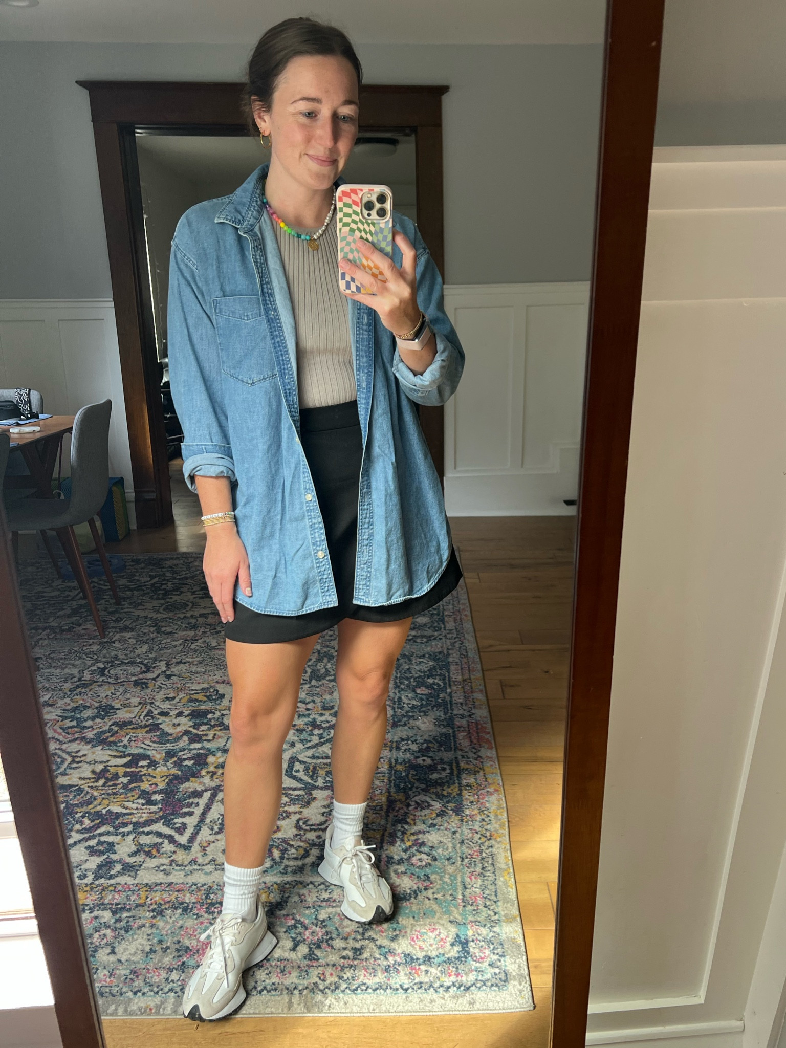 Another new combo with old pieces for a Monday WFH outfit. Paired a taupe sweater tank with a black mini skirt, then added my oversized denim shirt, Athleta crew socks and New Balance 327s :) linking similar items!