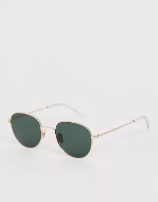 Monokel Eyewear Rio round sunglasses in gold | ASOS UK
