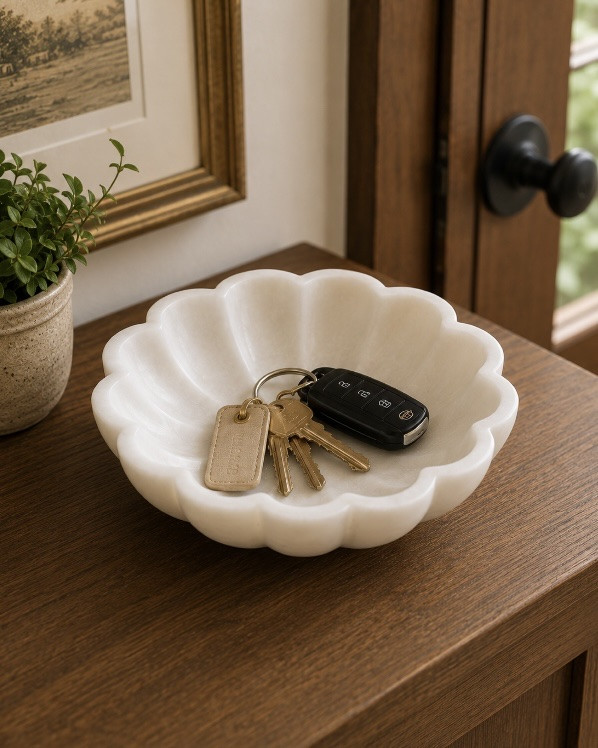 One little Amazon find, three ways . I love finding pieces that are pretty and useful, and this scalloped marble dish is exactly that. Style it on a stack of books, use it as a catch-all for keys by the door, or keep jewelry together on a bathroom counter. Such an easy little detail that makes a space feel more collected—and it would make a great gift too. Linked here on LTK!