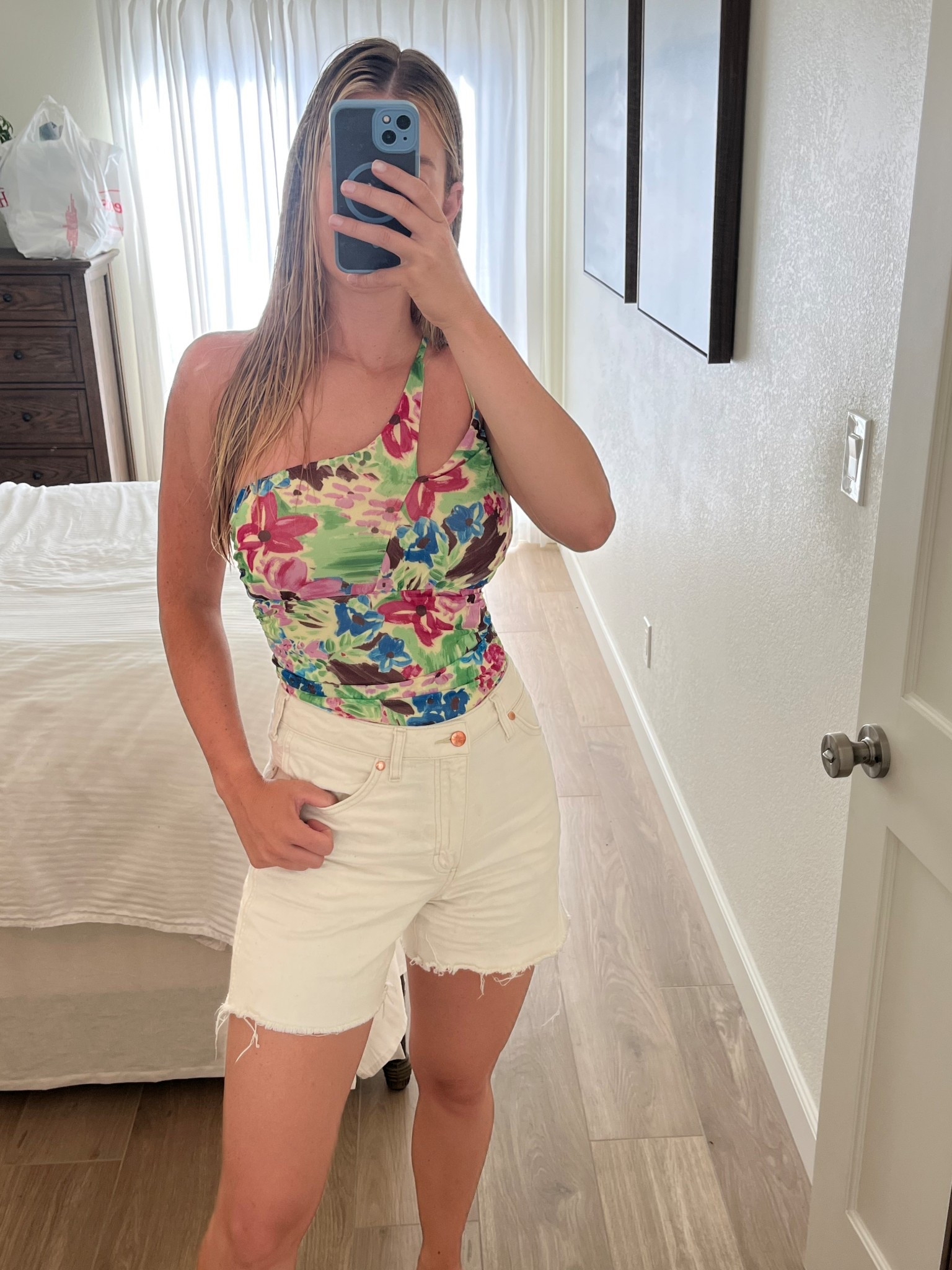 Fun floral summer top & my favorite Wrangler shorts. Can’t find them in white anymore, but they have others colors!! 

#LTKSummerEdit #LTKSeasonal #LTKFindsUnder50