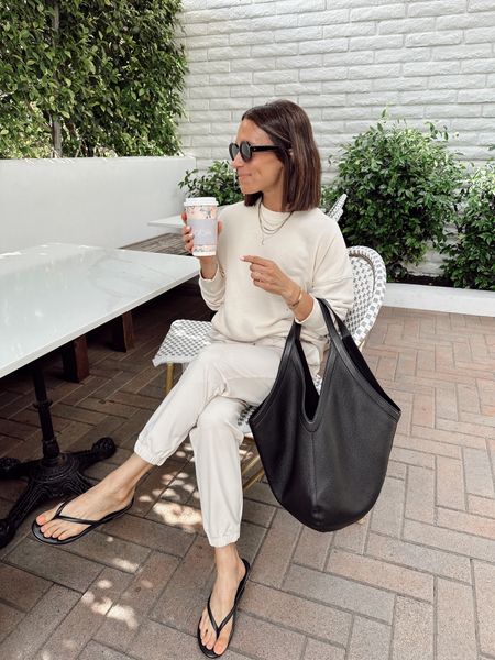 Comfortable outfit for travel, school drop, weekends, or casual everyday 
Joggers are so soft, wearing an Xs 
Sized up one in the sweatshirt for a looser fit, wearing a small 
Sandals are so comfortable and 10% off with code ITSYBITSYINDULGENCES10

#LTKover40