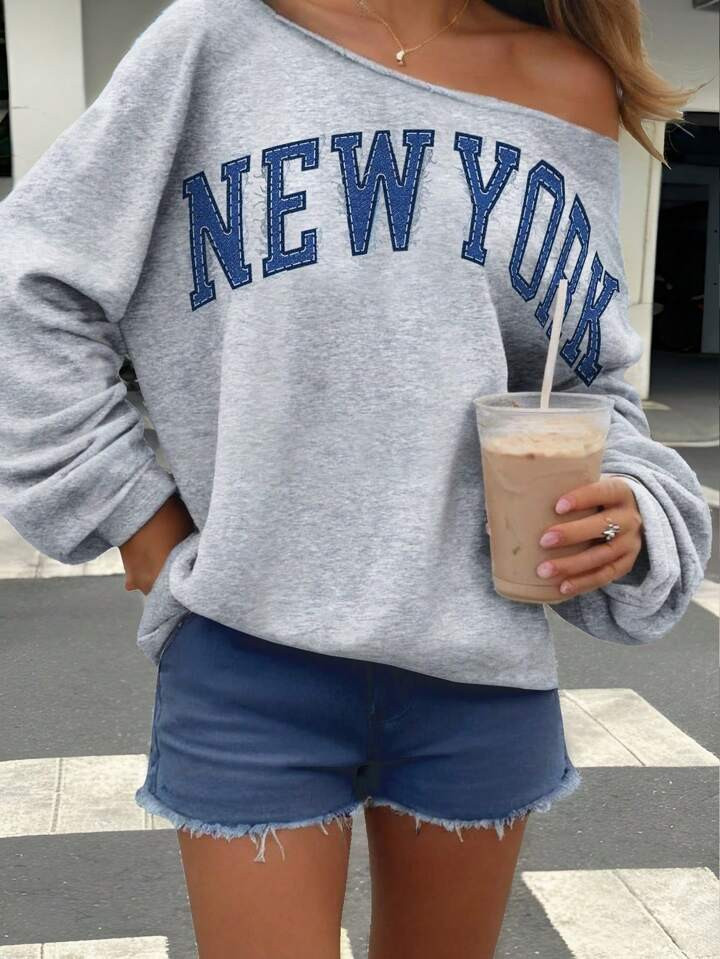 SHEIN Jersey holgado de manga larga con estampado del lema "New York" para adolescentes, escote c... | SHEIN