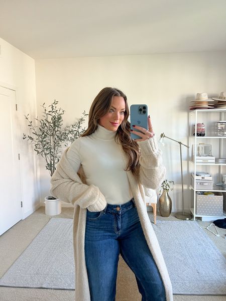 This turtleneck is a simple wardrobe staple. It comes in a lot of different colors, I am  wearing a size medium. Can be worn on its own or underneath cardigans, jackets, blazers, etc. 

This cardigan is a bit of splurge but it is the COZIEST thing! Wearing a size medium!

#LTKSeasonal #LTKmidsize #LTKstyletip