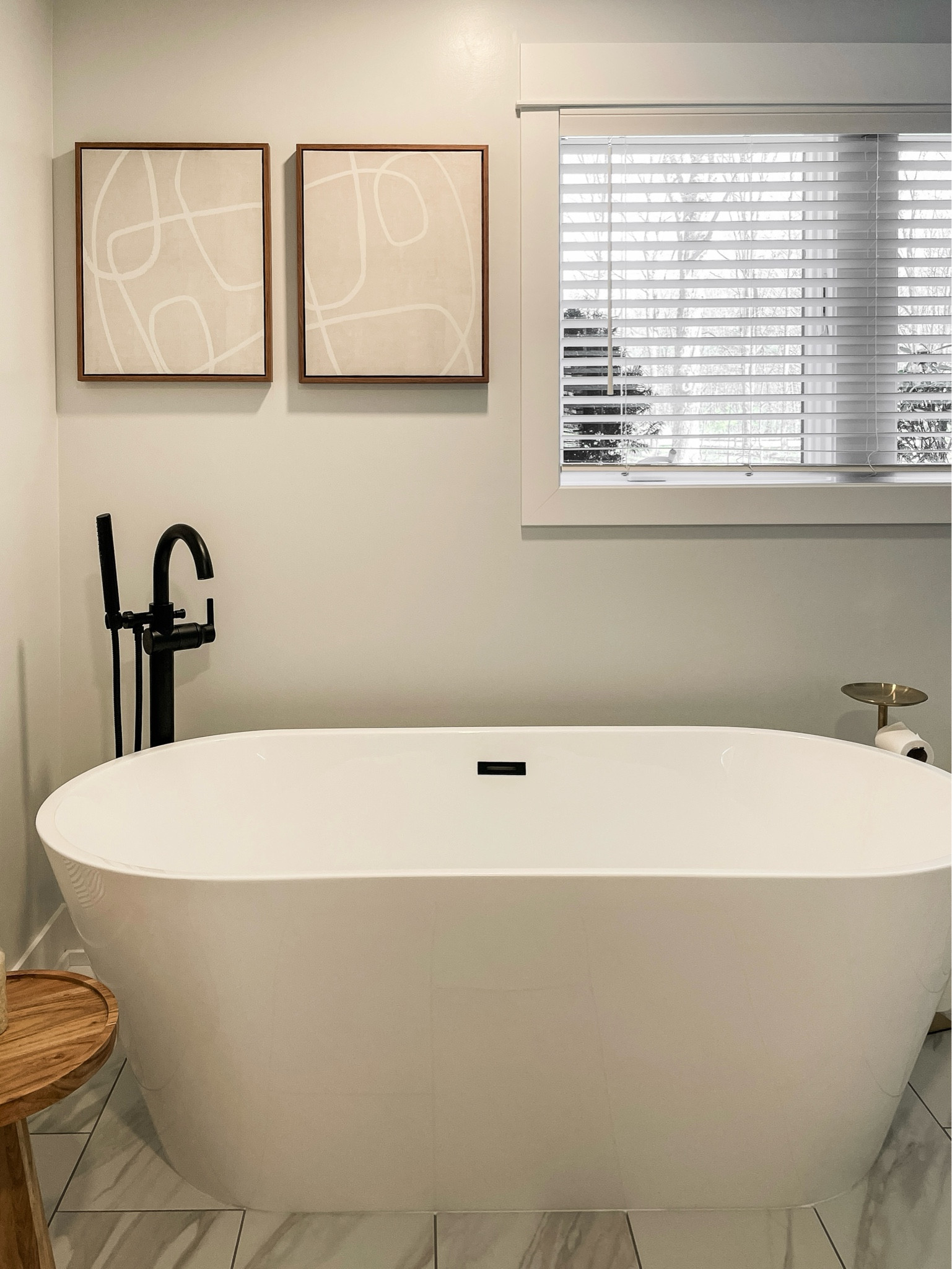 Isn’t this freestanding so beautiful?  And guess what, it’s only $599!  

Bathtub.  Freestanding tub.  Black bath filler.  Modern art.  

#LTKhome #LTKfamily #LTKsalealert