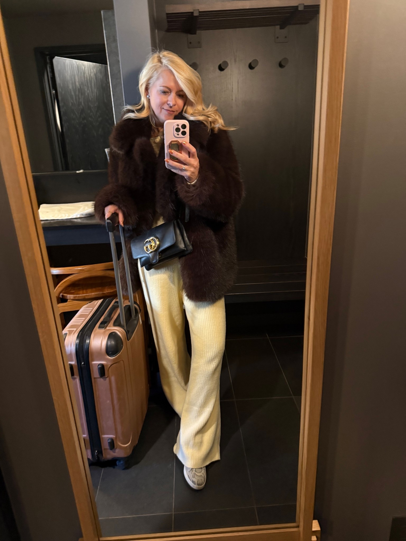 Travel outfit that I’m obsessed with! 
Brown faux fur jacket, luggage, crossbody bag, butter yellow loungewear set XS, snakeskin sneakers 

#LTKgrwm #LTKTravel #LTKootd
