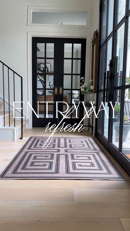 Can’t believe that this designer inspired rug for my entryway is from Walmart! I added this modern fluted vase from Amazon to my other vintage decor to keep with that modern vintage style in this space. Linked similar half round tables and mirrors!

#LTKunder50 #LTKstyletip #LTKhome