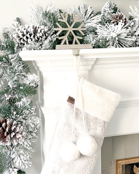 These snowflake stocking holders come in a set of two and are 40% off right now! Garland, holiday decor, Christmas stocking, Ugg 

#LTKhome #LTKsalealert #LTKCyberweek