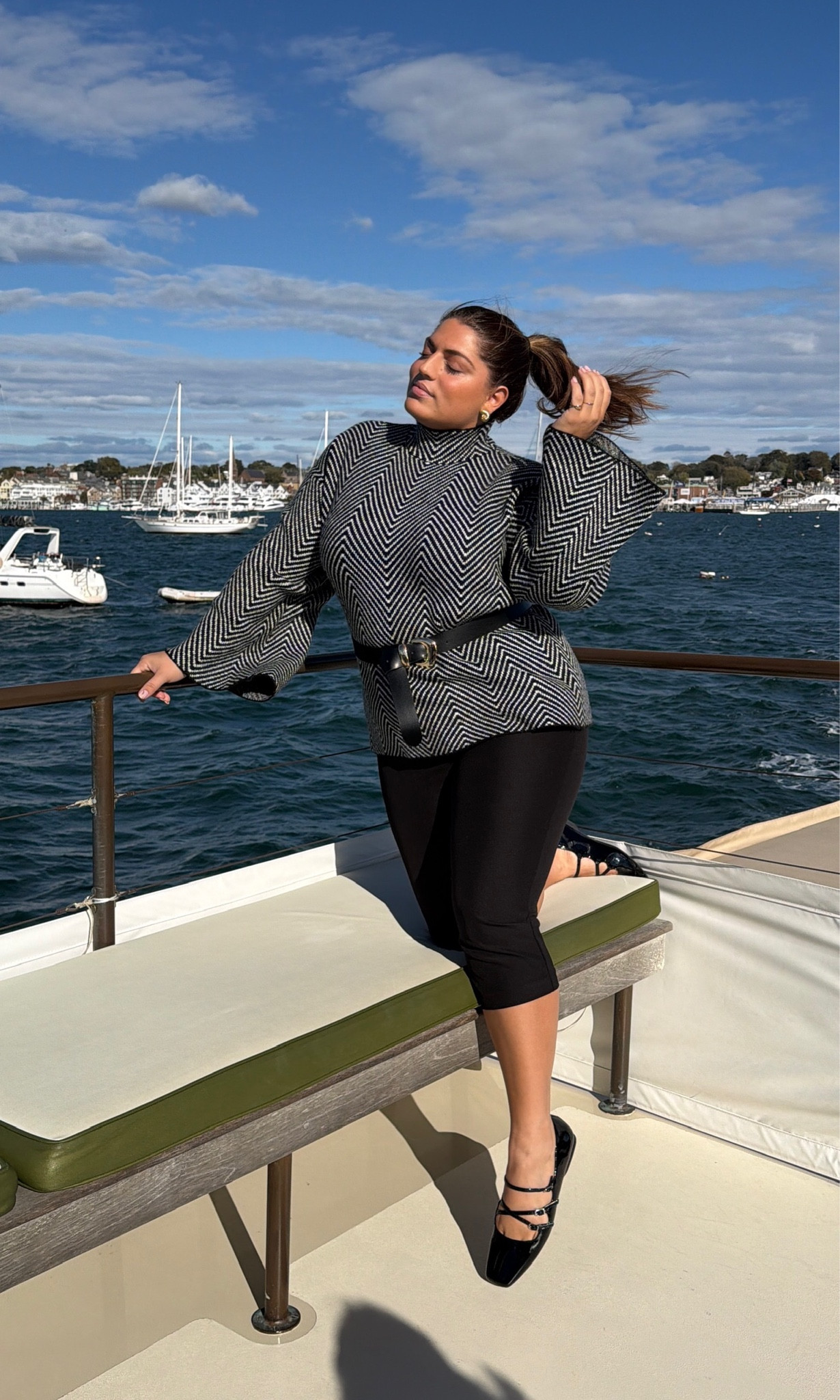 Newport, RI boat day fit!!☺️🛥️ it was def more windy so this cozy sweater was the perfect fit for fall/winter time! love my black capris i wear all the time from Revolve but sadly they are sold out, so linking a few similar great options!! & paired with these cute DSW flats🖤 this fit is giving me old moneyyyy chic vibes😜🤩

#LTKStyleTip #LTKPlusSize #LTKMidsize