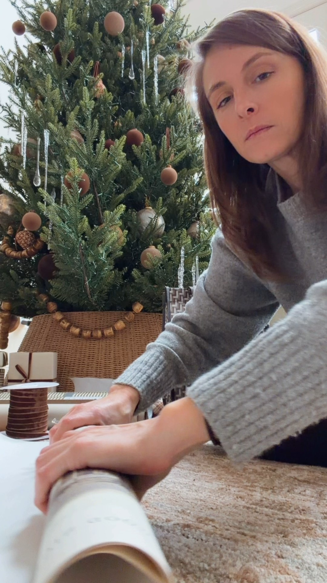 Wrapping paper bands! Game changers for keeping the roll from unraveling

#LTKSeasonal #LTKHome #LTKHoliday