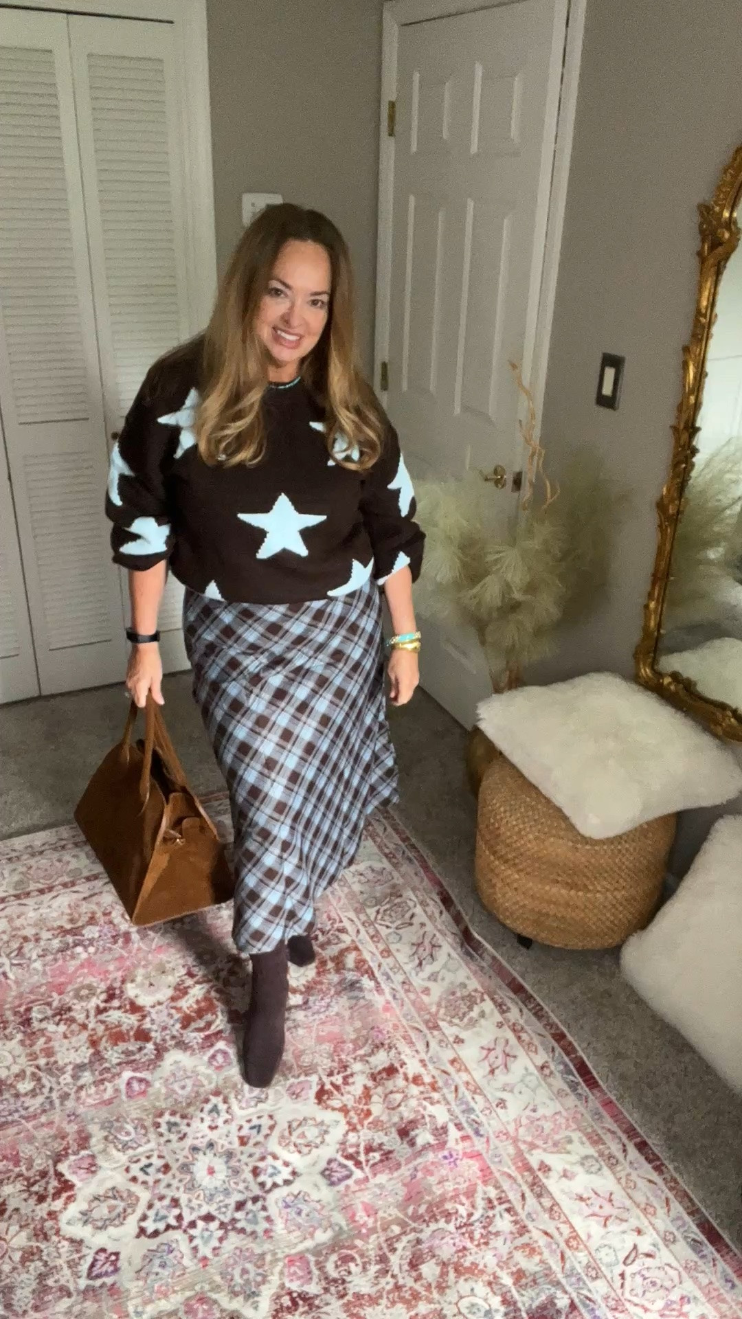 Pattern mixing! Stars and plaid! Same color family is the trick 💙🤎. 

A beautiful knit sweater paired with the perfect long plaid skirt . Fall preview.

#LTKgrwm #LTKSeasonal #LTKWorkwear