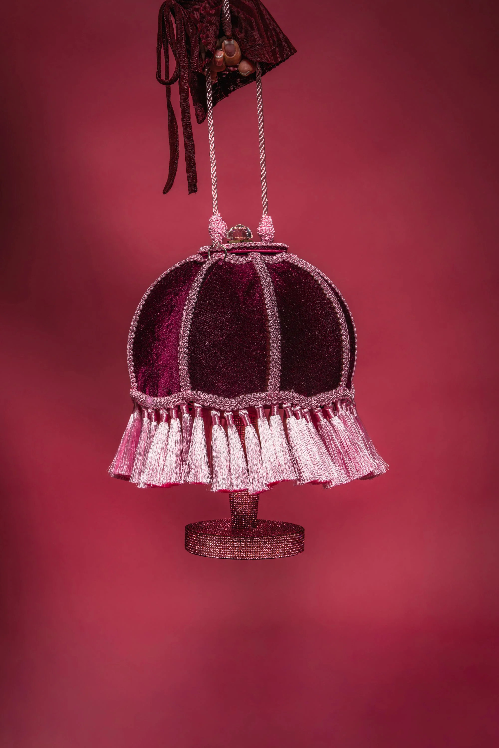 KEEP THE LIGHTS OFF TASSEL PURSE | AKIRA