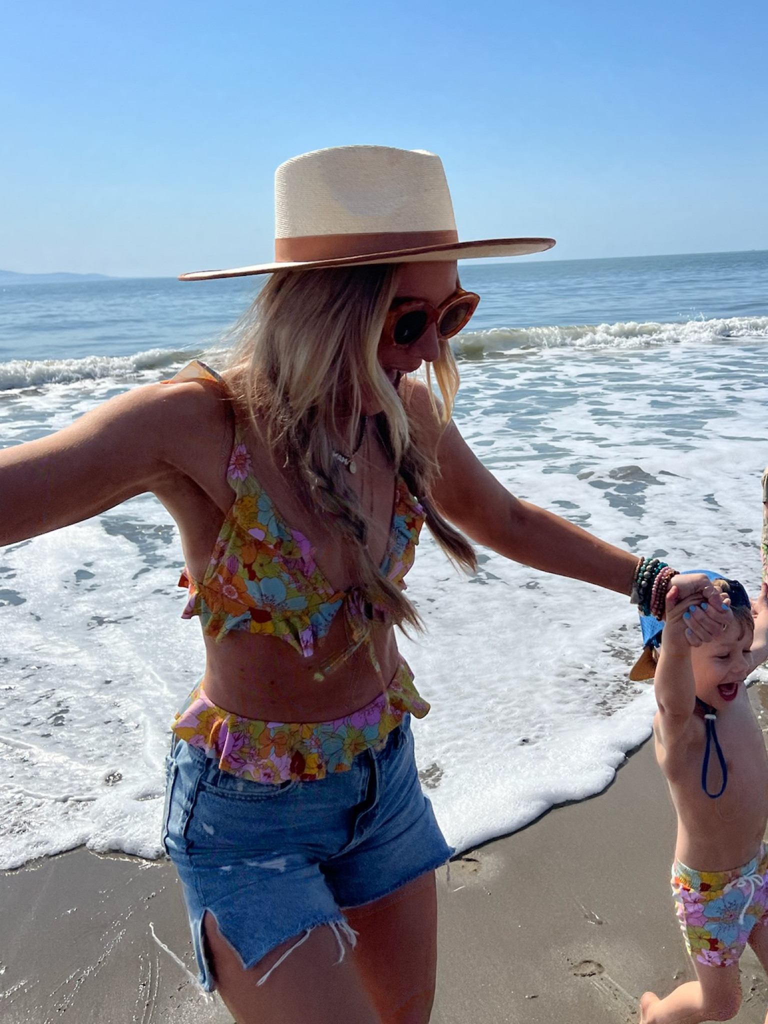 Matching swimsuits! 👙 our exact print is sold out but linking almost identical from same brand! I'm in xs top, s bottom, and Tage is in a 2t 

#LTKkids #LTKfamily #LTKswim