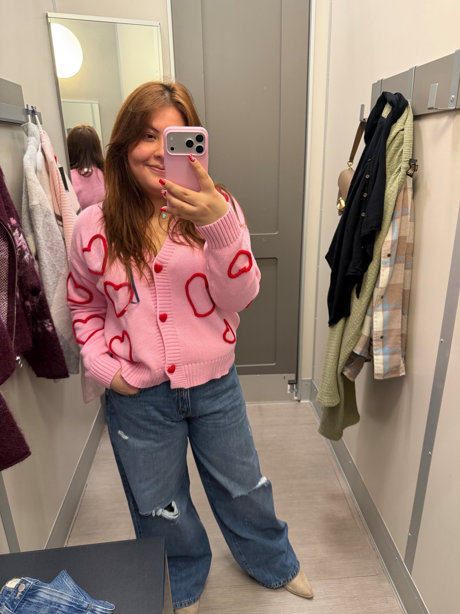 Love the cardigan it is perfect for Valentine’s Day. The cardigan size is a large and the jeans are a size 10.

#LTKFindsUnder50 #LTKSaleAlert #LTKMidsize