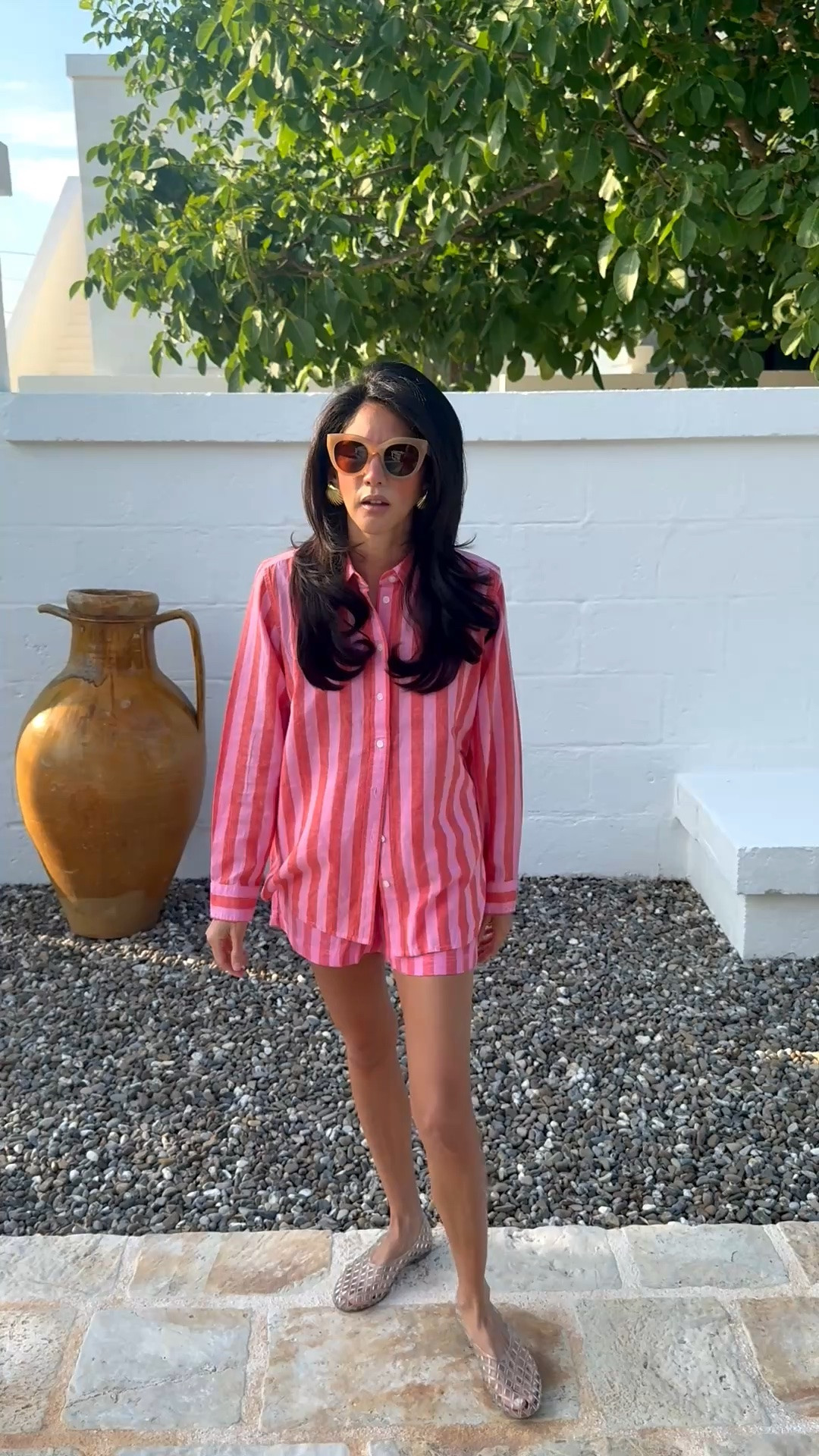 Puglia uniform: unlock ☀️🍋 This striped linen set is doing double duty — lounging at the hotel, then straight to lunch with zero outfit change. That’s the dream, right?

It’s from @jcrew and on sale right now — sizing up on the shirt for that oversized, breezy fit. Paired with jelly flats because I refuse to suffer for cobblestones.

Real talk: I don’t buy pieces for one photo. This is getting rewear after rewear all summer. 🩷🧡

#LTKootd #LTKTravel #LTKSeasonal