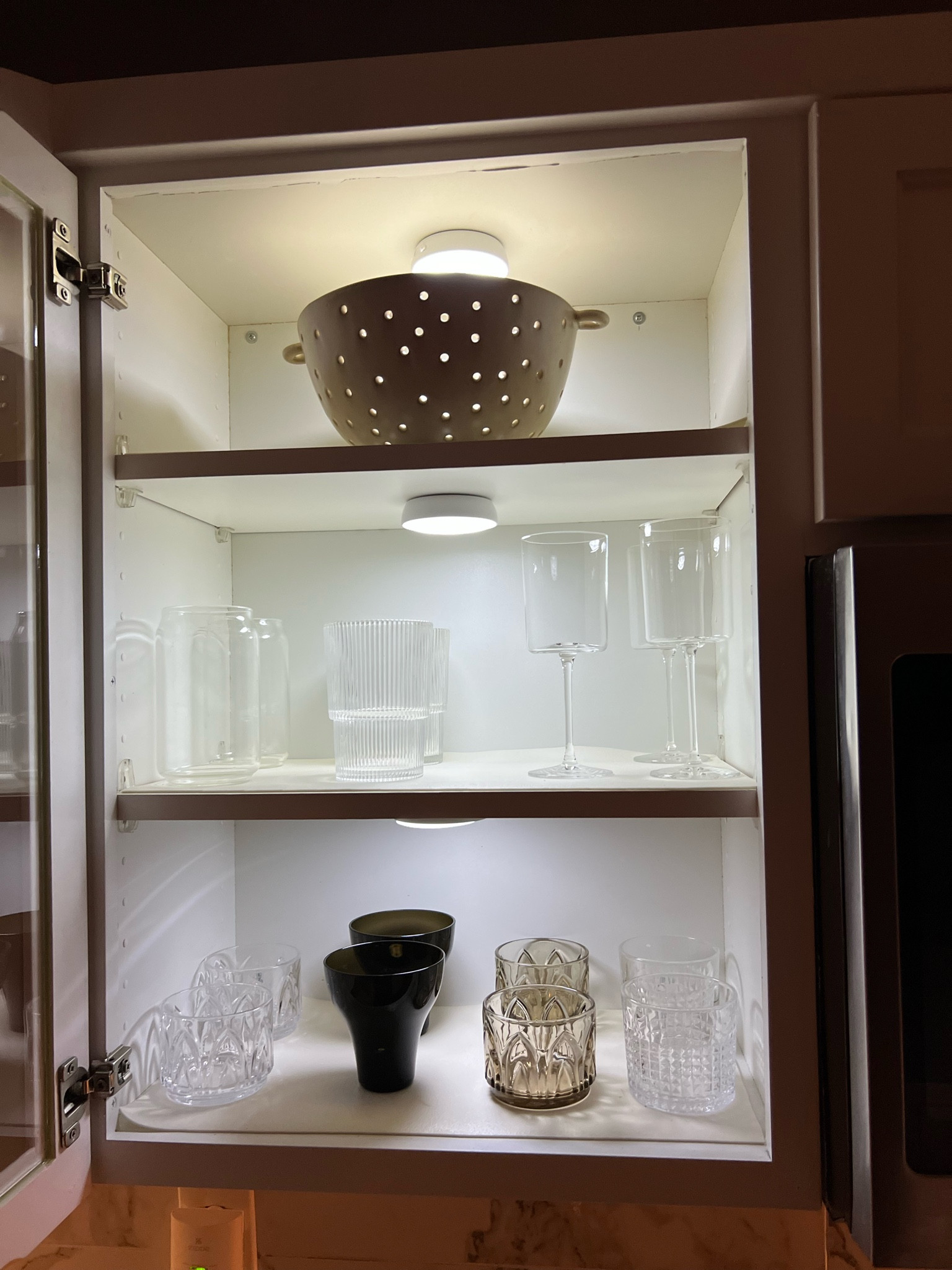 Kitchen organization, kitchen cabinet light- watch my new fall décor videos on YouTube (lovely at home) 

Cb2 glassware, glassware, fall decor 

#LTKhome #LTKSeasonal #LTKstyletip