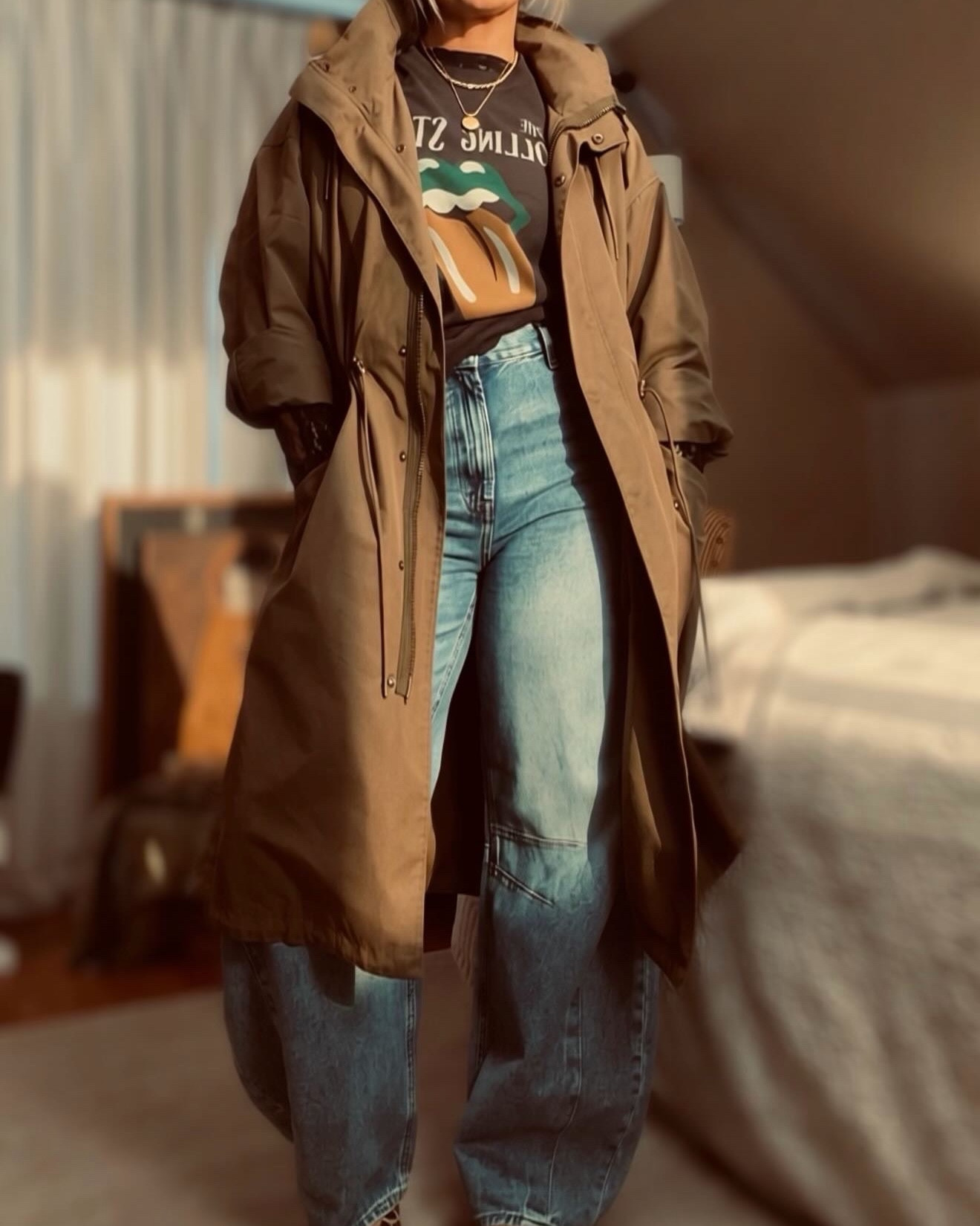 GAP horseshoe barrel jeans styled with an American Eagle graphic tee and a lace layering tee for that elevated, effortless look. Finished with a classic GAP trench coat and Target leopard flats for an easy, chic outfit that works year-round. This casual everyday outfit blends relaxed denim, timeless layering pieces, and affordable staples for a cool, modern vibe that’s easy to recreate and dress up or down.
Jeans are on sale. 

I’m 5”8’ and a size 12, wearing a size 31 tall fo a classic fit. 
Graphic tee: L/XL option for an oversized fit
Jacket: Large Tall Option
Lace shirt: XL
SHOES: 10 women’s 
@gapstyle 
@American Eagle Outfitters @Target 

#LTKMidsize #LTKSaleAlert #LTKootd #LTKSaleAlert #LTKootd #LTKMidsize