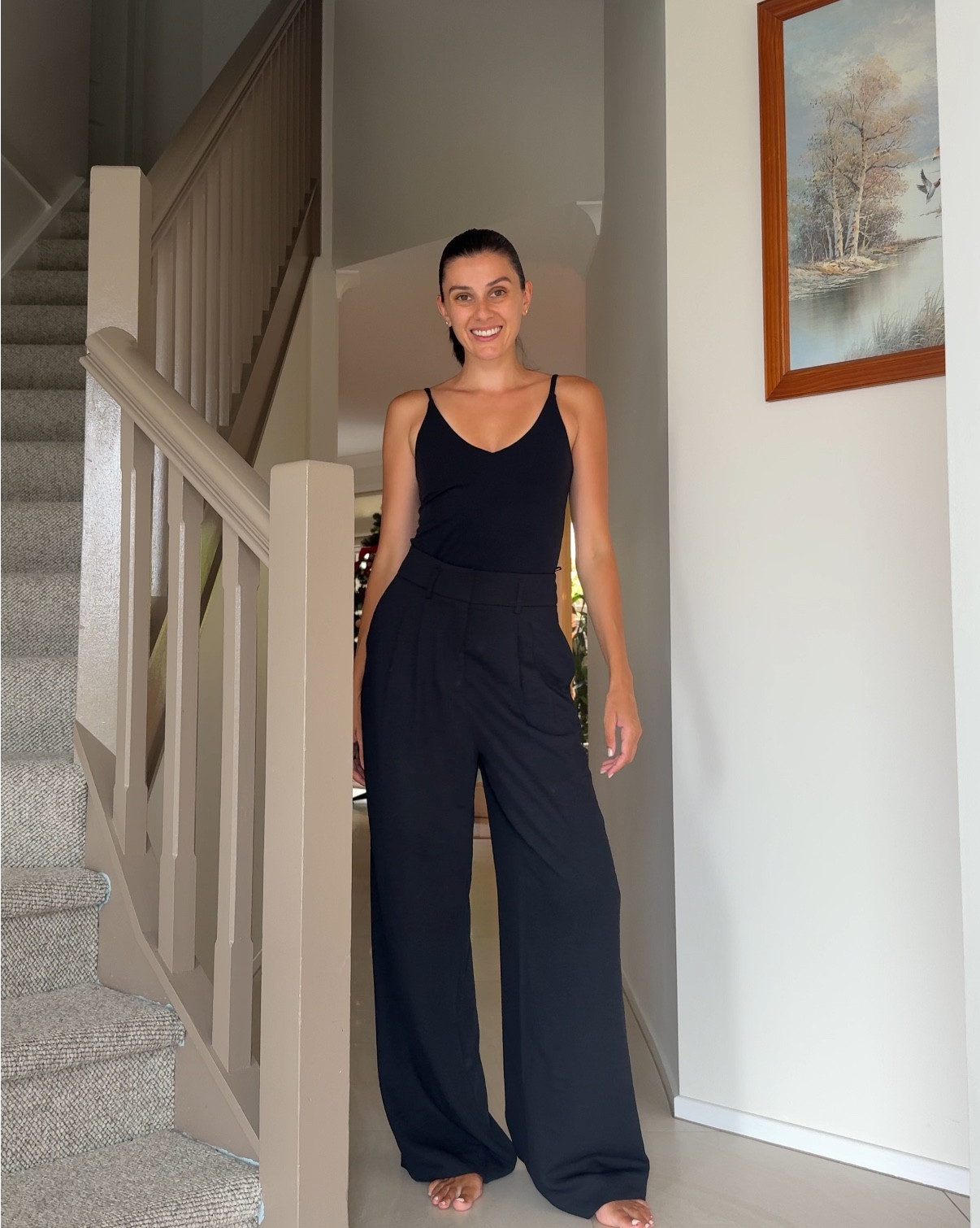 Today’s mum outfit that took 30 seconds to pull together and no ironing required!!! 🖤

Tank + Oversized Shirt - @Nimble Activewear (I absolutely love this combo. The tank has a built in bra but it’s actually so comfy and doesn’t dig in. I wear this tank multiple times a week). I wear an XS in the tank and a S/M in the oversized shirt. 

Pants - @sabastyle These pants are a great wardrobe staple. I find myself reaching for them multiple times a week as well. They are nice and light so good for summer as well. I love that they drape on the floor. As a tall/ long legged girly (170cm) I find it so hard to find the perfect wide leg pant length. These absolutely meet all expectations. I am wearing a size 8. 

Slides - @BILLINI SHOES A pair on high-rotation. I also have them in brown. 

Bag - @Seed Heritage Such a good one for summer! Fits so much and super chic. 

Sunglasses - @miumiu A staple. You’ll see me wear these most days and include in most outfit reels as they go with absolutely everything. 

#ootd #dailyoutfits 
