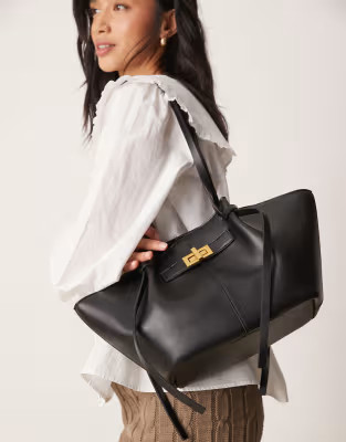 Gina Tricot small faux leather tote bag with strap and clutch with gold detail in black | ASOS | ASOS (Global)