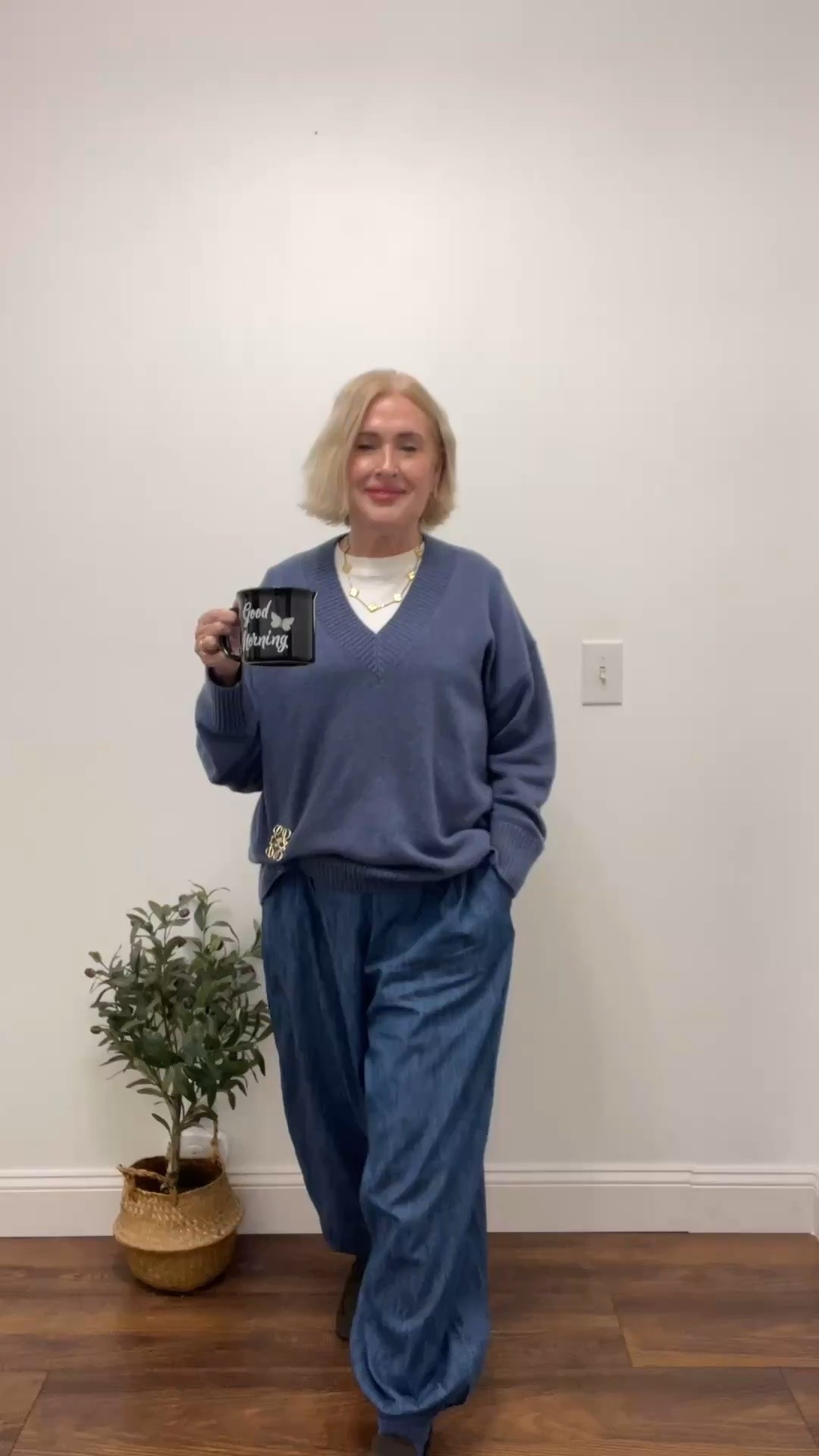 A casual day at home editing . Here I am wearing: 
* Dusty blue cashmere Jumper from Quince
* Cos basic tshirt
* H&M denim balloon jeans 
* Amazon gold brooch 
* Flattered suede loafers
* Amazon “Good Morning” coffee cup ☕️ 
#casualoutfits #minimalchic  #balloonjeans #barelljeans 

#LTKPetite #LTKdayinmylife #LTKootd
