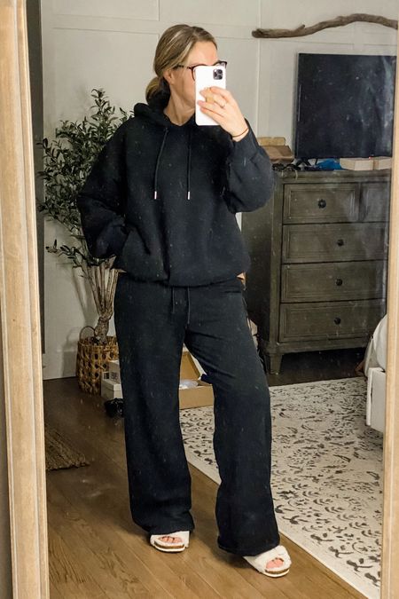 The perfect black lounge set | hoodie sweatshirt with pockets and wide leg drawstring pants with pockets. Both stretchy and super buttery soft. True to size  

#LTKSale #LTKstyletip #LTKFind