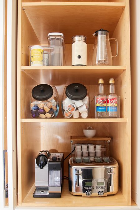 We love using these slant back black led glass jars from the container store to store coffee pods, cookies, and so much more! 