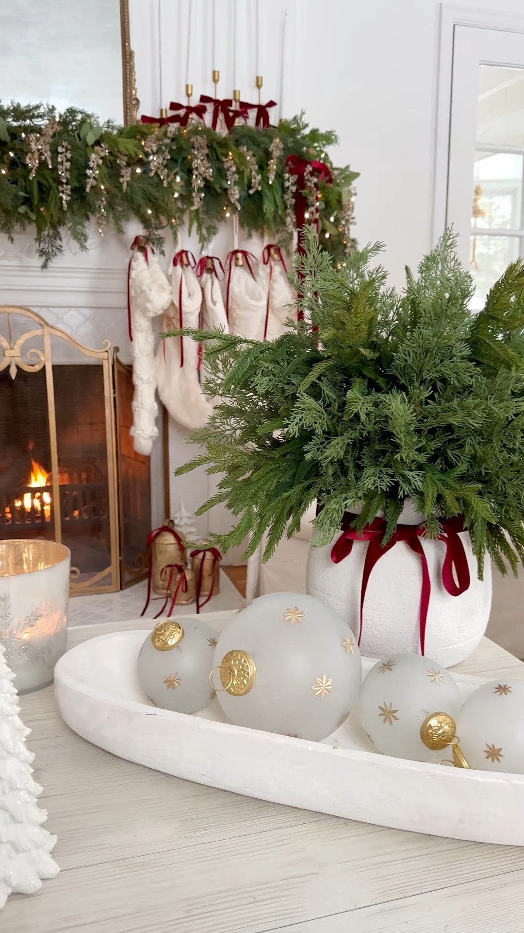 Christmas coffee table | Christmas greens | Christmas stems | red Christmas | Christmas mantel | Christmas mantle | stockings | ornaments 

#LTKdayinmylife #LTKGiftGuide #LTKHoliday