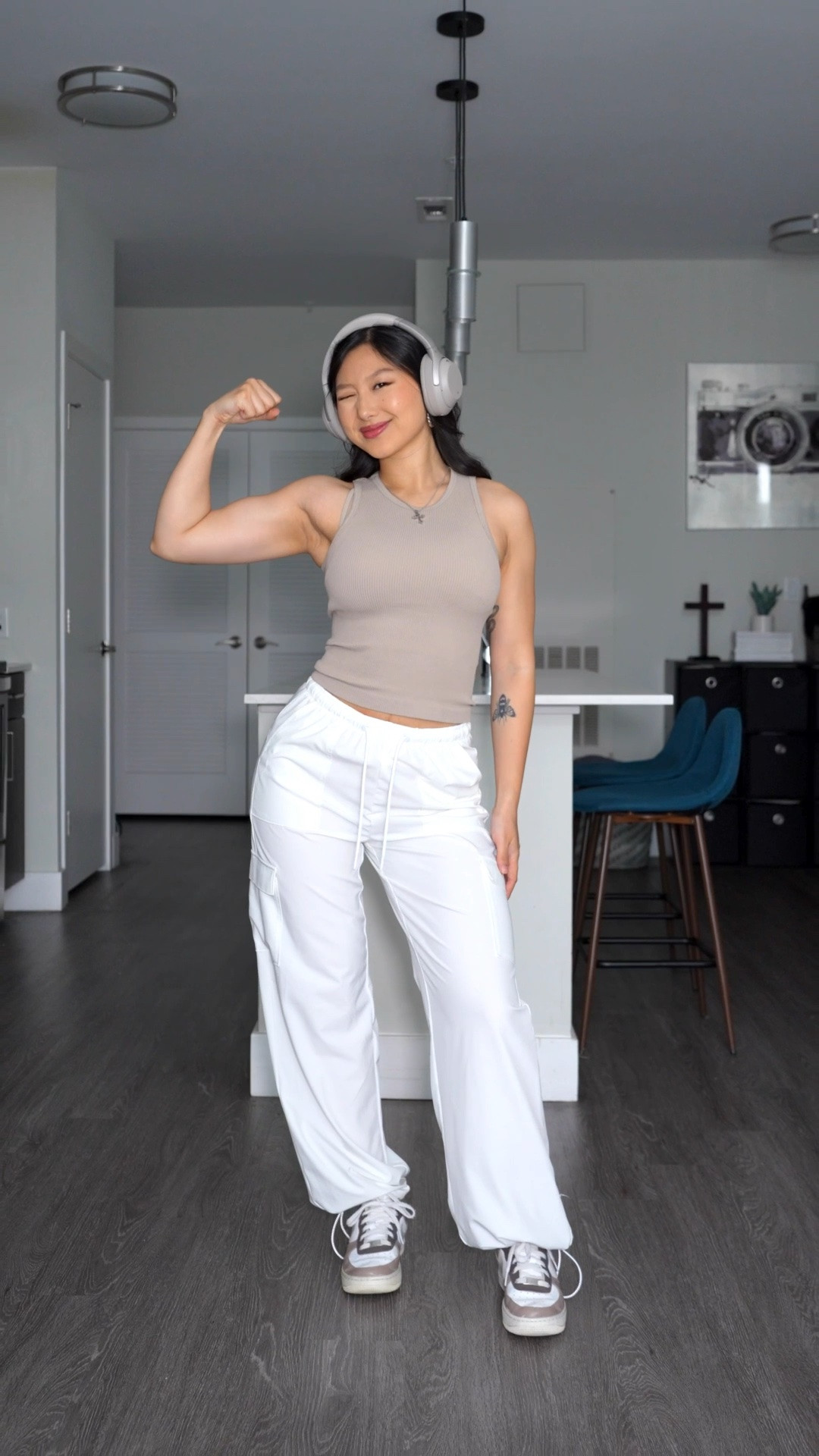 Black Fitted Tee: size XS
Tan Ribbed Tank: size S
White Wrap Top: size XS/S
Black Leggings: size 2
Dad Sneakers: true to size
Pink Zip Jacket: size XXS
Black Cargo Joggers: size XS
Converse High Top Sneakers: 1/2-1 size down
Graphic Tee: Elevated Faith, can’t link (code: VANESSACHEN)
Linking similar products

How to style, style tips, gym outfit, workout outfit, lifting, outfit idea

#LTKfitnessgoals #LTKselfcare #LTKootd