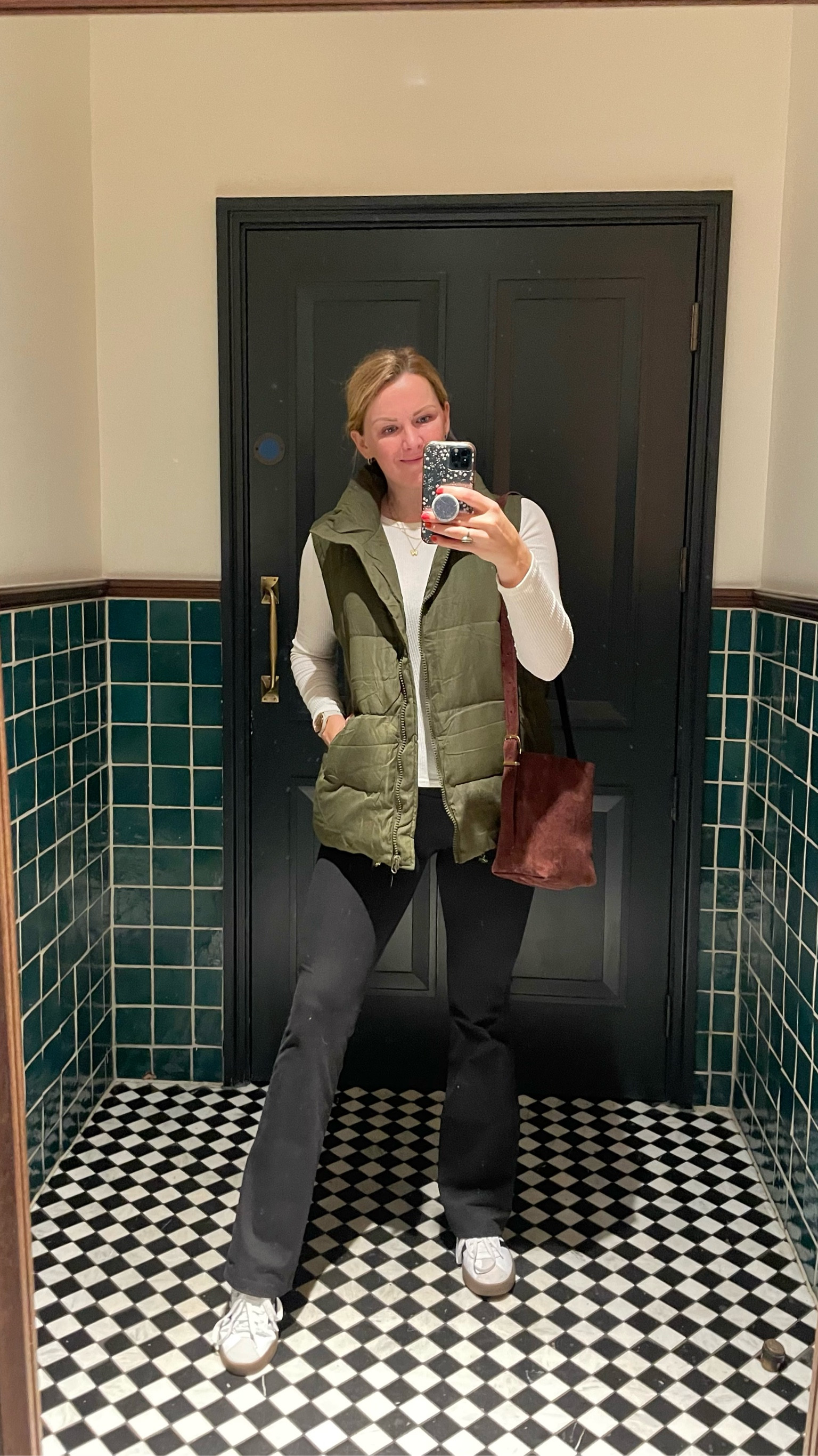 Travel to London outfit of the day

Oversized quilted puffer vest in army green. Paired with flared leggings, ribbed long sleeve tee.

Tee is a daily deal for only $7! I sized down one. Wearing my normal size in everything else.

Brown suede mini tote crossbody bag

Not pictured quarter zip sweater for an extra layer


#LTKSeasonal #LTKtravel #LTKfindsunder100