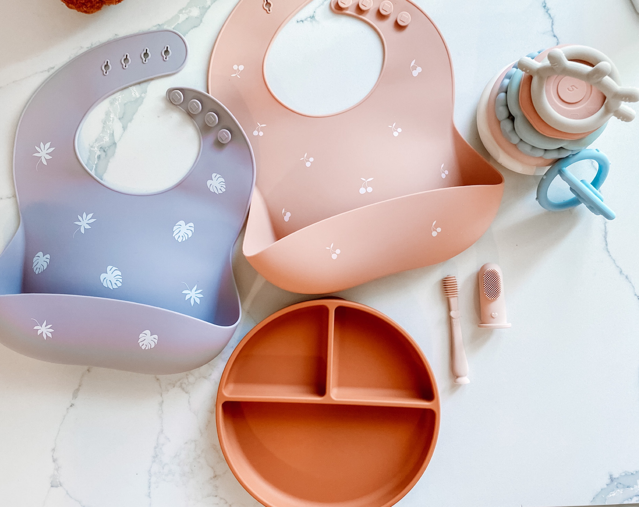Throughout my journey of being a mom, I have found that silicone products are the way to go!

These items here are all BPA/PVC/Phthalate free + are made with durable silicone material! 

•2x pack silicone bibs. 
•Silicone suction plate with lid. 
•Silicone baby oral cleaning kit.
•Silicone stacking toy, that also works as teething toys. 

#LTKSale 

#LTKCyberweek #LTKbaby #LTKfamily