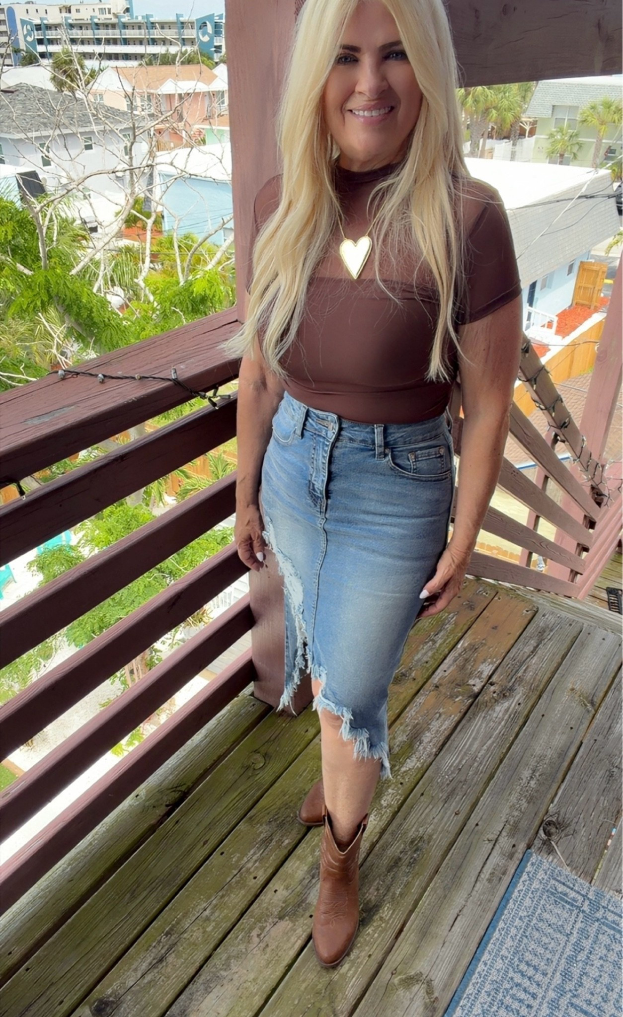 Asymmetrical denim skirt styled with a brown mesh overlay bodysuit and short cowboy boots 🤎 Such a fun western-glam outfit for concerts, girls’ nights, or trendy everyday styling.

#LTKOver40 #LTKPetite #LTKootd