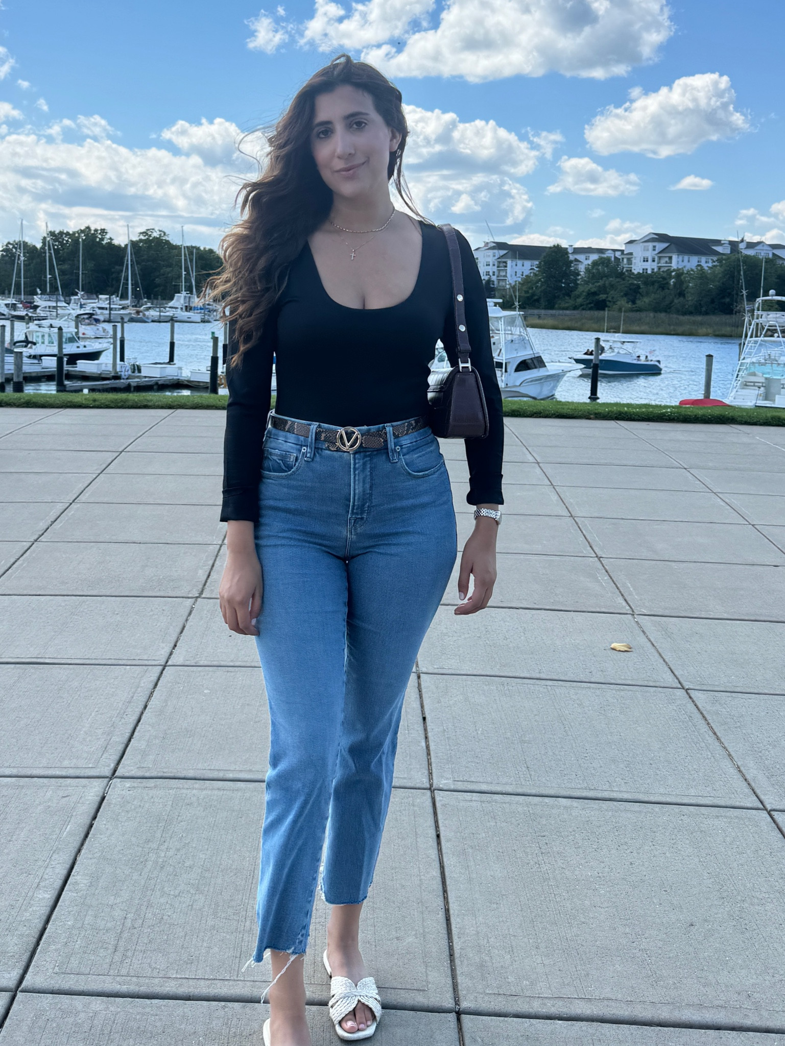 I’m wearing a size medium top and 6 jeans fits true to size and comfyortable