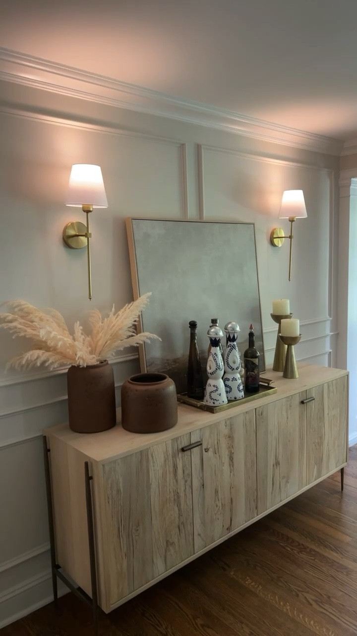 Battery operated wall sconces come in a set of 2 in 2 colors. You charge the light bulbs with a USB charger and you can dim the lights and choose cool/warm color settings. 

Brown vases are old Target // wall color is BM Balboa Mist 

wall lights, home decor, dining room decor, Amazon find 

#LTKhome #LTKFind