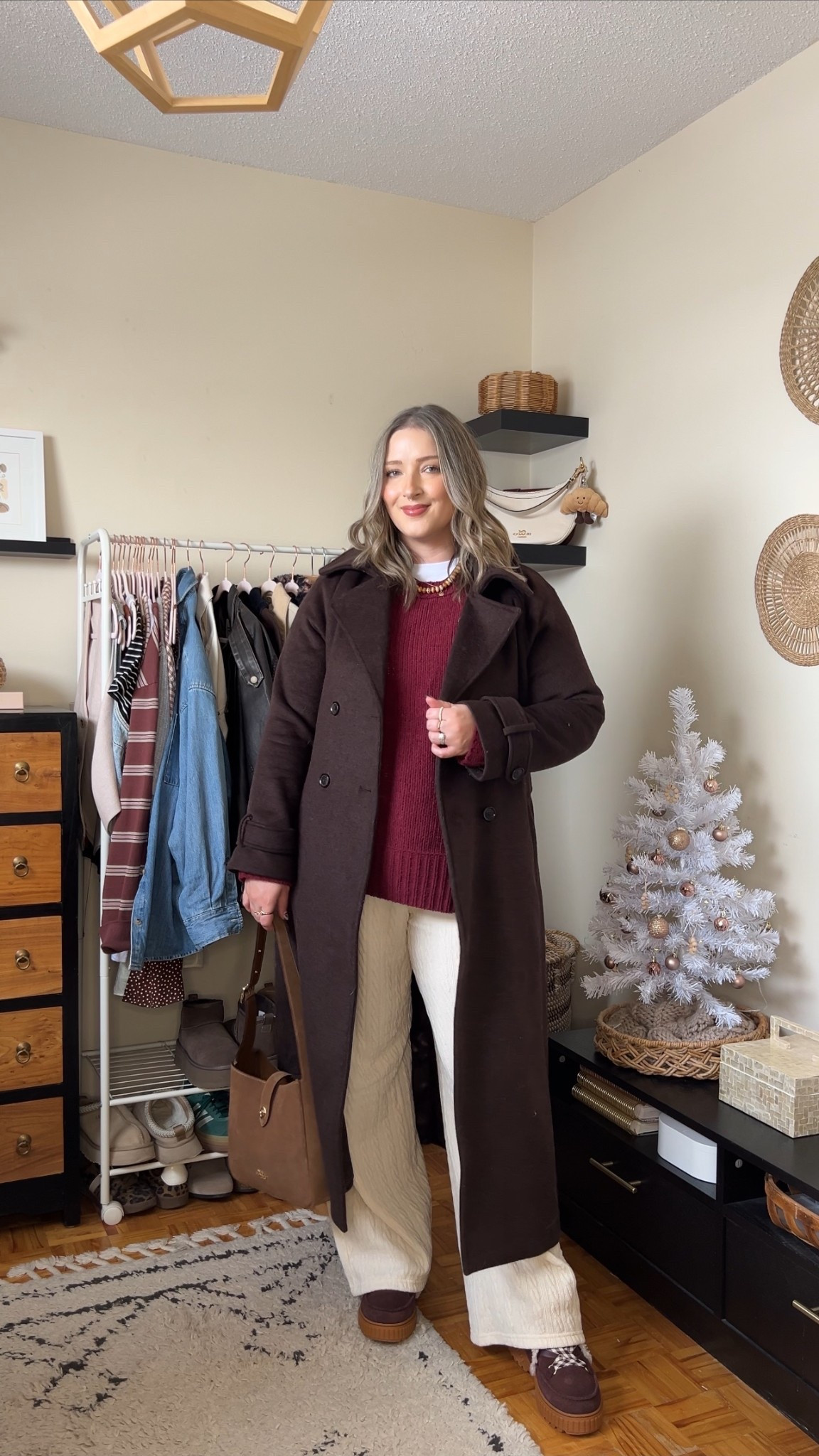 Comfy winter outfit! Cream cable knit wide leg lounge pants, wearing my usual size L. Also wearing L in the softest burgundy chenille sweater. I love the high neck on this white tee for layering! Wearing L. This chocolate brown wool trench coat is such a good winter staple piece, wearing L. My Sorel snow boots are waterproof and so warm! Consider sizing up if you plan to wear thick socks


#LTKwinter #LTKsale #LTKmidsize