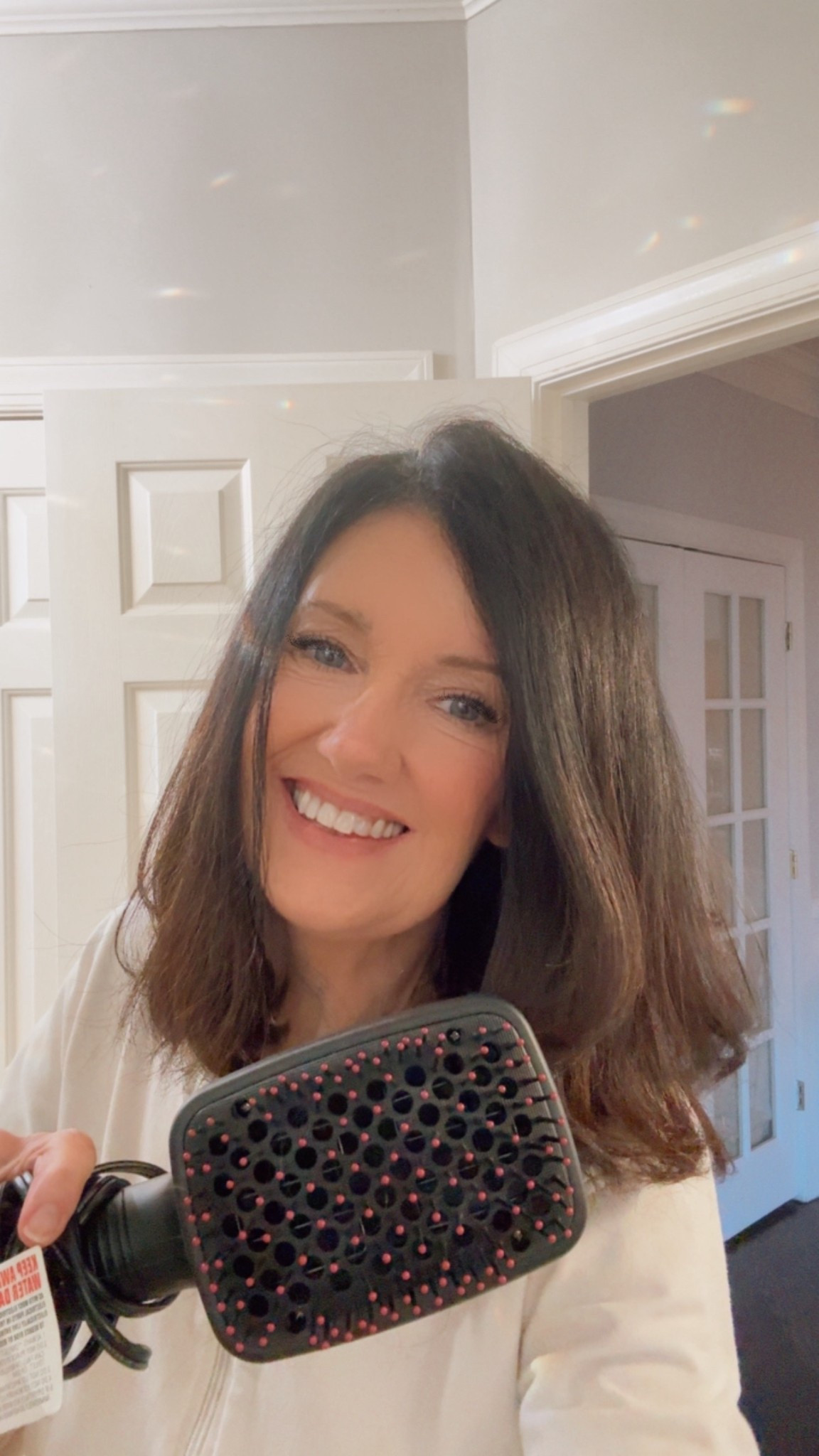 My hair is proof you don’t need to spend hundreds of dollars on a hair dryer. I love this one. Nothing fancy, it drys my very thick hair quickly, and the attached paddle brush helps smooth my hair.  It’s  very easy to use and affordable at under $40. 
#hairdryer 

#LTKdayinmylife #LTKBeauty #LTKselfcare