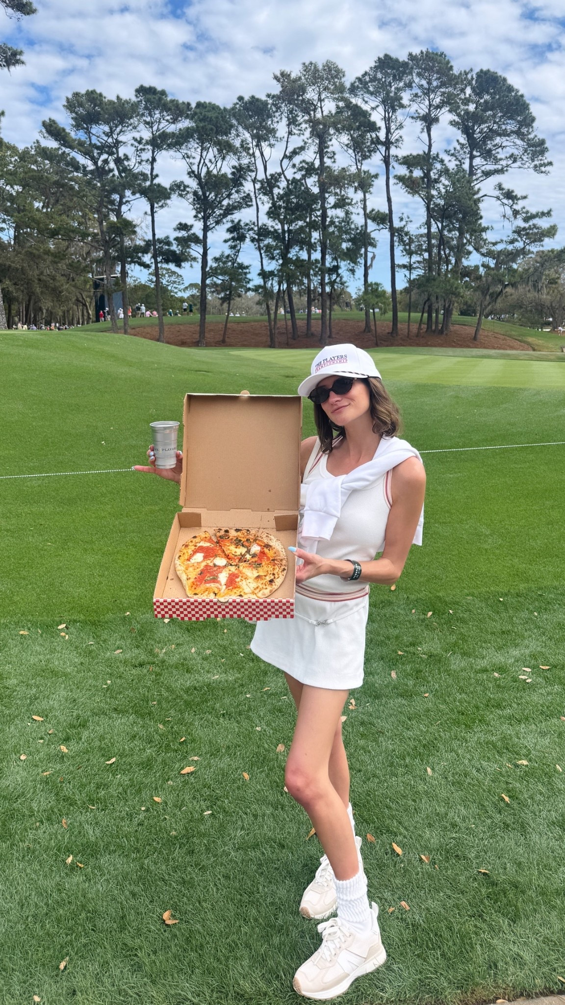 ⛳️&🍕in my white skort set. Use code [BRITTANYN35] for 35%-OFF vicicollection.com site wide. #theplayers #themasters #golf 

#LTKActive #LTKSaleAlert #LTKootd