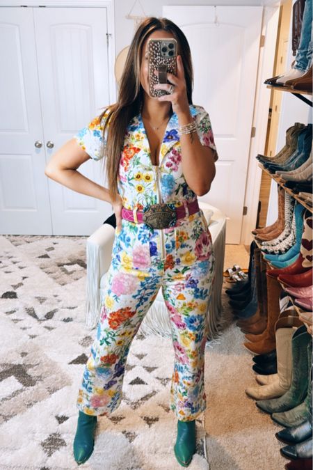 Show me your mumu floral romper jumpsuit jumper - wearing a medium - country concert outfit - Nashville outfit - spring outfit - summer outfit - belt and cowgirl boots - booties 

#LTKfindsunder50 #LTKsalealert #LTKstyletip