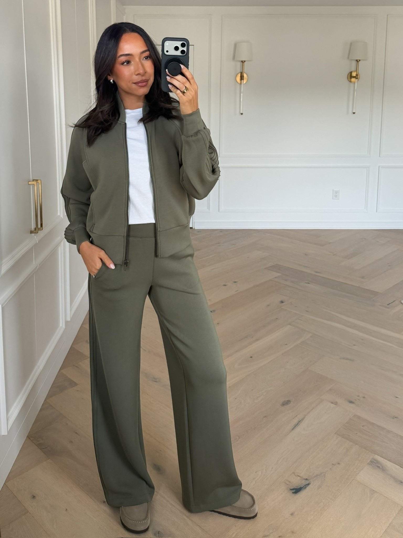 Use code AE25 to save 25% off full-priced AirEssentials!! This material is my favorite of all time for loungewear, travel and my go-to airport outfit! The moss green color is perfect for fall 🤩 Wearing size S tank, size S track jacket and size XS wide leg pant

#LTKSeasonal #LTKTravel #LTKSaleAlert
