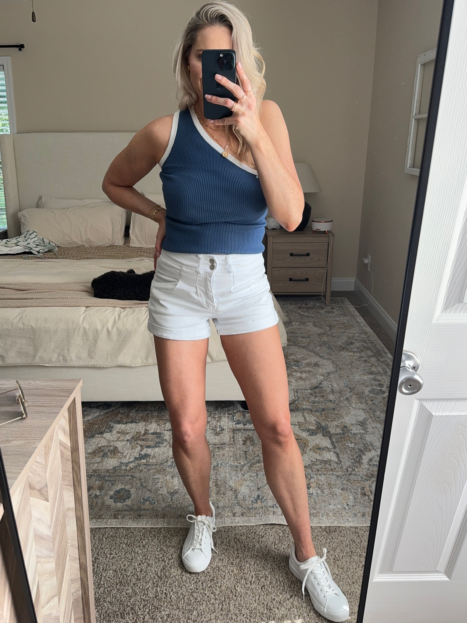 White tank, white shorts and white sneakers 