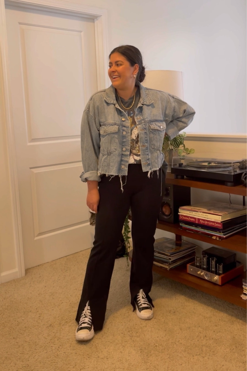 Casual midsize fall outfit; Metallica band tee, split hem black pants (large), cropped denim jacket; converse sneakers 